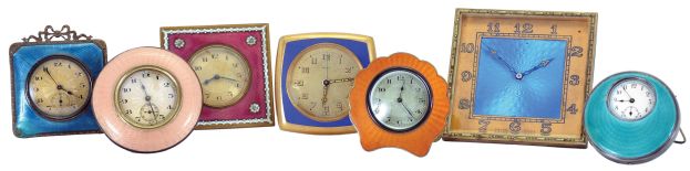 Clocks- 7 (Seven): All with easel backs, six decorated with guilloche enamel, the last in plain blue enamel, 30 hour and 8 day timepiece movements, 20th century, dimensions of largest clock listed