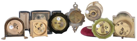Clocks- 7 (Seven): including two "Lux" parasol novelties, a German alarm with lavender enamel and decorated dial, a miniature cartel style, a Zenith travel alarm with case, a British United novelty with velvet lined base, and a Seth Thomas