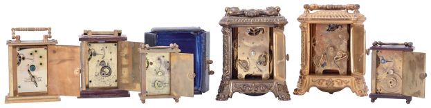 Carriage clocks- 6 (Six): All Waterbury, one with outer case, and two repeaters with fancy gilt cases