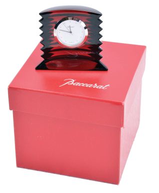 Clocks- 9 (Nine): including one in red Baccarat crystal with original box, one in Murano glass, one in Waterford crystal, a reproduction "Zappler", and others, quartz and mechanical movements, together with a pocket watch form pill case