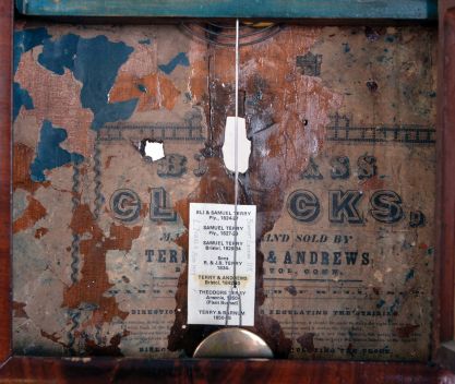 Terry & Andrews, Bristol, Conn., 8 day, time and strike, weight driven brass movement, column OG shelf clock. This clock usually seen with a Joseph Ives or Hills, Goodrich & Co. label. Joseph Ives designed the movement.