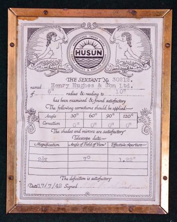 Sextant- Boxed sextant by Henry Hughes & Sons of London. WWII-era English marine instrument with black finish in original finger-jointed box with brass hardware. Inside of box has framed "HUSUN" examination certificate dated 1942. Serial number 30121 is stamped on instrument and printed on examination certificate.