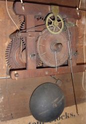 Seth Thomas, Plymouth, Conn., "Off Center Pillar and Scroll" clock with a weight driven 30 hour time and strike wooden movement in a mahogany veneered case.