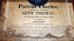 Seth Thomas, Plymouth, Conn., "Off Center Pillar and Scroll" clock with a weight driven 30 hour time and strike wooden movement in a mahogany veneered case.