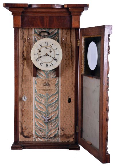 Munger & Benedict, Auburn, New York, 8 day, time and strike, weight driven brass movement ironing board top wall clock.