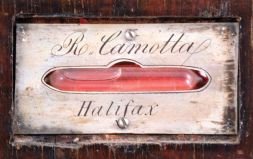 R. Camotta, Halifax wheel barometer with thermometer, hygrometer and level in inlaid mahogany case