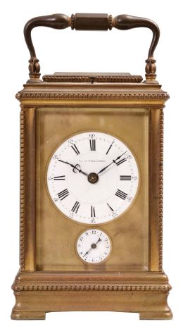 France for Bailey, Banks & Biddle, Philadelphia, Penn., carriage clock, 8 day, time and petite sonnerie with alarm, lever escapement, repeat button sounding the last hour and quarter, all in a gilt brass case with beveled front, side, back, and top glasses, white enamel dials.