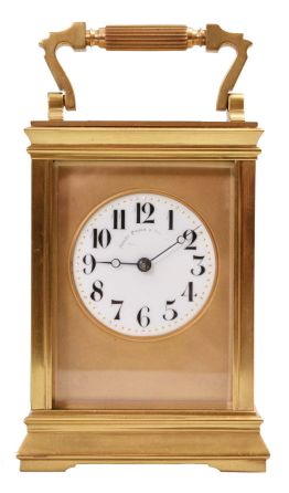 Couaillet Freres, France for Bailey, Banks & Biddle, Philadelphia, carriage clock, 8 day, time and strike, spring-driven movement with lever escapement in a polished brass Anglaise case with five beveled glasses, white porcelain dial with Arabic numerals and blued steel Breguet hands, all in original leather carrying case.