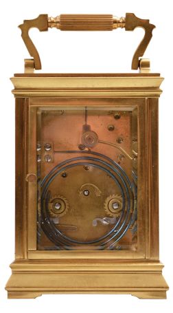 Couaillet Freres, France for Bailey, Banks & Biddle, Philadelphia, carriage clock, 8 day, time and strike, spring-driven movement with lever escapement in a polished brass Anglaise case with five beveled glasses, white porcelain dial with Arabic numerals and blued steel Breguet hands, all in original leather carrying case.