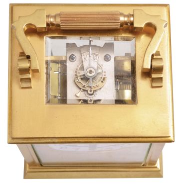 Couaillet Freres, France for Bailey, Banks & Biddle, Philadelphia, carriage clock, 8 day, time and strike, spring-driven movement with lever escapement in a polished brass Anglaise case with five beveled glasses, white porcelain dial with Arabic numerals and blued steel Breguet hands, all in original leather carrying case.