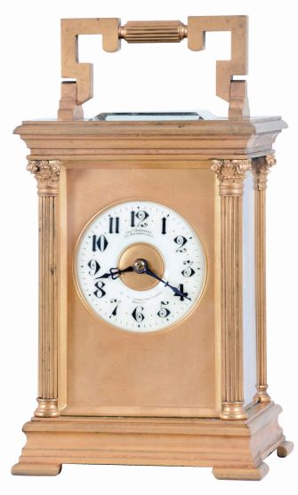 France, for Joseph Hartmann, Berlin, a giant carriage clock, gilt Anglaise Riche variant case with beveled glasses, Arabic numeral white enamel dial with gilt mask, blued steel hands, 8 day, time and strike movement with lever platform, cut bimetallic balance with gold timing screws, and counting the hours on a gong