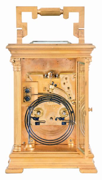 France, for Joseph Hartmann, Berlin, a giant carriage clock, gilt Anglaise Riche variant case with beveled glasses, Arabic numeral white enamel dial with gilt mask, blued steel hands, 8 day, time and strike movement with lever platform, cut bimetallic balance with gold timing screws, and counting the hours on a gong