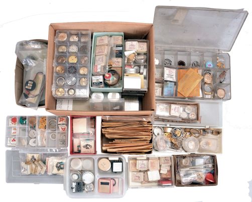 Large lot of Bulova Accutron material, including coils, crystals, dials, hands, cases, movements, index wheels, and more