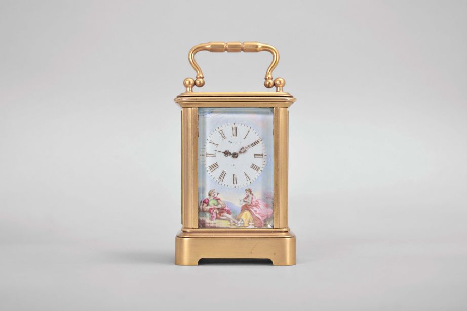 France, a mignonette No.1 carriage clock, glazed, gilt Corniche case, roman numeral, polychrome enamel dial depicting a young couple in a landscape, fancy gilt hands, 8 day, timepiece movement with lever platform, the back plate marked "A.B. Depose", and inside of front plate with letter B within a circle