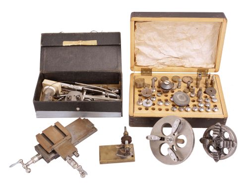 Tools- 8mm and 10mm Lathe Accessories: lot includes more than 20 8mm wire chucks, wax chucks, and arbor-mounted tools, tool rest accessories, tool rest accessories, a small pivot polisher attachment, a Derbyshire cross slide, 10mm four jaw chuck, 10mm faceplate, and more.