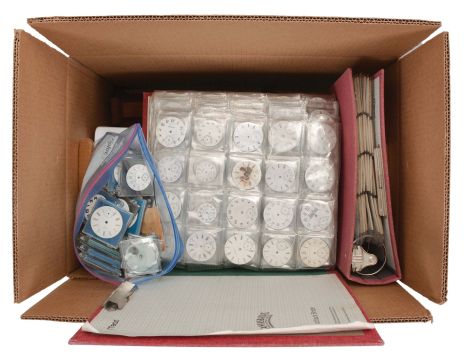 Box of Watch Dials: hundreds of dials in one lot. White enamel pocket watch dials by makers such as Hamilton, Elgin, South Bend, Waltham, Illinois, Hampden, and others. One three ring binder with wrist watch dials by Longines, Omega, Elgin, Gruen, Bulova, Hamilton, and others. The lot also includes 3 watch price guides, a pocket watch holder, and one novelty wrist watch.