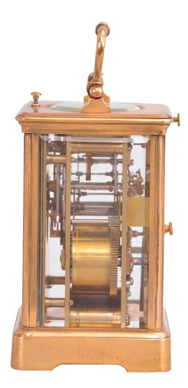 France, an unusual, five minute repeating carriage clock with single gong, gilt Corniche case with beveled glasses, Roman numeral white enamel dial, blued steel distaff hands, 8 day, time and strike movement with lever platform, counting the hours in passing, repeating the last hour when activated by top pusher, and repeating the last five minute interval through the pusher at case back