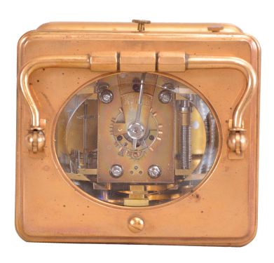 France, an unusual, five minute repeating carriage clock with single gong, gilt Corniche case with beveled glasses, Roman numeral white enamel dial, blued steel distaff hands, 8 day, time and strike movement with lever platform, counting the hours in passing, repeating the last hour when activated by top pusher, and repeating the last five minute interval through the pusher at case back