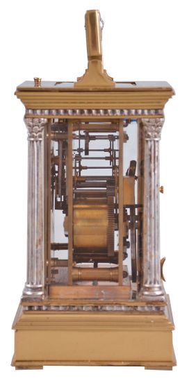 France, a gilt and silvered, Anglaise Riche cased hour repeating carriage clock, the architectural case with stepped, molded base and cornice, the corners with Corinthian columns, solid back with shutter for winding and setting apertures, and top with carrying handle, roman numeral silvered dial signed "Dent London", blued steel spade and poker hands, 8 day, two train movement with lever platform, striking the hours and half hour in passing, and repeating the last hour on demand