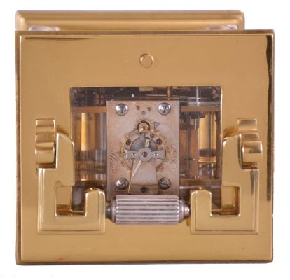 France, a gilt and silvered, Anglaise Riche cased hour repeating carriage clock, the architectural case with stepped, molded base and cornice, the corners with Corinthian columns, solid back with shutter for winding and setting apertures, and top with carrying handle, roman numeral silvered dial signed "Dent London", blued steel spade and poker hands, 8 day, two train movement with lever platform, striking the hours and half hour in passing, and repeating the last hour on demand