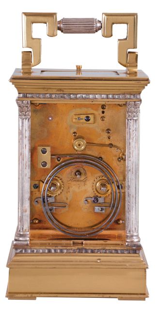 France, a gilt and silvered, Anglaise Riche cased hour repeating carriage clock, the architectural case with stepped, molded base and cornice, the corners with Corinthian columns, solid back with shutter for winding and setting apertures, and top with carrying handle, roman numeral silvered dial signed "Dent London", blued steel spade and poker hands, 8 day, two train movement with lever platform, striking the hours and half hour in passing, and repeating the last hour on demand