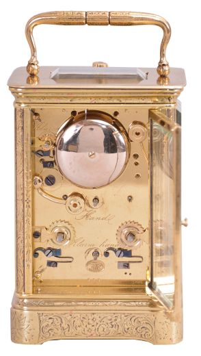 Japy Freres & Cie., an engraved, Corniche cased, hour repeating carriage clock with sweep seconds, the case replete with engraved floral and foliate ornament, Roman numeral white enamel dial with subsidiary, arabic numeral alarm chapter, three train brass movement with lever platform ornamented with Asian market style engraving, striking the hour and half hour in passing, and repeating the last hour on demand