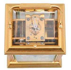 France, attributed to Gaye, Lamaille, & Co., a fine, Aesthetic Movement, porcelain paneled hour repeating carriage clock, the gilt, Cannelee variant case with folding handle, the sides set with panels depicting a potted flower in blue, on a cream ground, also with floral ornament, and with blue, wheatear border, the Arabic numeral dial with ornament matching the side panels, blued steel spade and whip hands, two train, 8 day movement with lever platform, striking the hour and half hour in passing, and repeating the last hour on demand, the back plate marked "Patent Surety Roller", and 1813