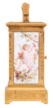 Switzerland, an exceptional miniature carriage clock with enameled panels, the engraved, gilt case nearly 3/4 inches smaller than a mignonette No.1, the sides and back with polychrome enamel scenes of disporting putti, the Roman numeral enamel dial with mask matching the exterior panels, each representing one of the four seasons, the base with engraved titles, "Hiver, Automne, Printemps, Ete", 30 hour, timepiece movement with cylinder escapement, and fabric covered travel case with key