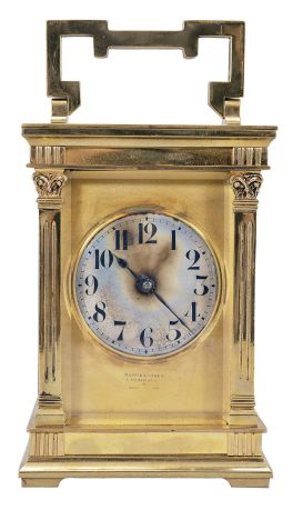 France, carriage clock, 8 day, time and strike counting the hours on a gong, spring driven movement with lever platform in an Anglaise case with fluted pilasters and and set with beveled glasses, gilt mask reading in part "Mappin & Webb Ltd. / 172 Regent St." surrounding a silvered dial with Arabic numerals, blued steel hands.