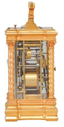 France, a good hour repeating, Anglaise Riche variant carriage clock with alarm, the gilt case with molded base and fluted band supporting twisted columns with Corinthian capitals, the entablature with fluted band, and stepped, molded cornice, case top with folding handle, roman numeral white enamel dial, blued steel distaff hands, three train movement with lever platform, sounding the hour and half hour in passing, and repeating the last hour on demand