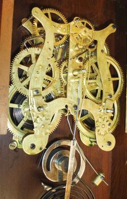 Seth Thomas Clock Co., Thomaston, Conn., "Utica" city series shelf clock with a spring driven, 8 day, time and strike (cathedral gong) movement in a walnut case.