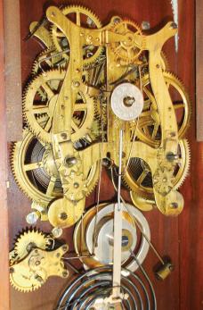 Seth Thomas Clock Co., Thomaston, Conn., "Beloit" shelf clock with a spring driven, 8 day, time, strike and alarm movement in a walnut case with burl accents.