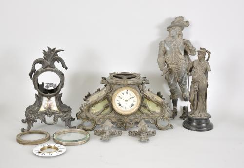 Clock parts- 8 (Eight) clock case, most for Ansonia figurals including a "Don Caesar and Don Juan" with movement, cast spelter figures, and two other clock cases with movements.