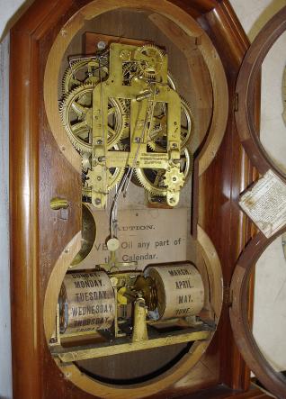 Seth Thomas Clock Co., Thomaston, Conn., "Parlor Calendar No. 5" shelf clock with a spring driven 8 day time and strike movement and a R. T. Andrews patented perpetual calendar mechanism in a walnut case.