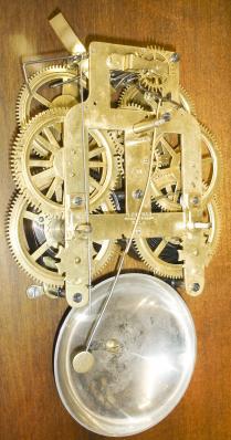 Seth Thomas Clock Co., Thomaston, Conn., "Queen Anne" wall clock with a spring driven 8 day time and strike movement in a walnut case.