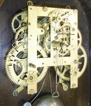 Wm. L. Gilbert Clock Co., Winsted, Conn., "Columbia", 8 day, time and strike spring driven brass movement calendar wall clock.