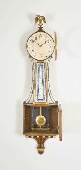 Waltham Watch Co., Waltham, Mass., 8 day, weight driven brass movement patent or banjo timepiece. Case is stamped "1826"