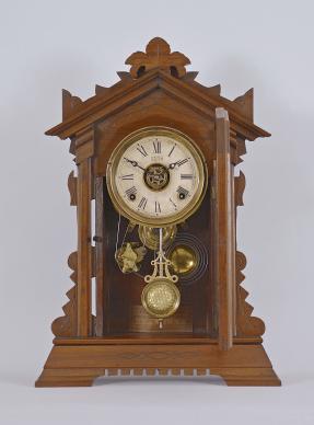 Terry Clock Co., Pittsfield, Mass., unidentified model shelf clock with a spring driven time, strike and alarm movement in a walnut case.