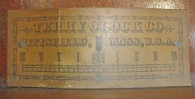 Terry Clock Co., Pittsfield, Mass., unidentified model shelf clock with a spring driven time, strike and alarm movement in a walnut case.