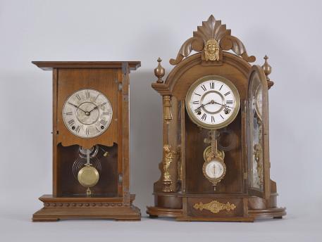 Clocks- 2 (Two): (1) Seth Thomas Clock Co., Thomaston, Conn., "Concord" shelf clock with a spring driven 8 day time and strike (cathedral gong) movement in a walnut case, c1885. (2) F. Kroeber, New York, NY, "Occidental" shelf clock with a spring driven 8 day time and strike (cathedral gong) movement in a walnut case, c1880.