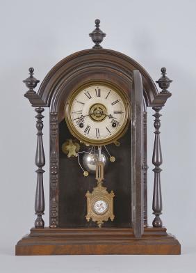 Welch, Spring &Co., Forestville, Conn., "Parepa" shelf clock with a spring driven 8 day time, strike and alarm movement in a rosewood case.