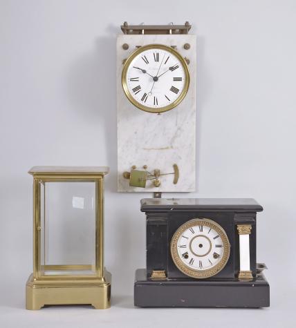 Clock parts, including an Electrique Brillie hanging clock with molded wooden case and marble backboard, the white enamel dial signed "L. Leroy & Co., a Paris", a "Wizard" coin operated trade stimulator in a black mantel case, and a crystal regulator style case for an unknown electric movement