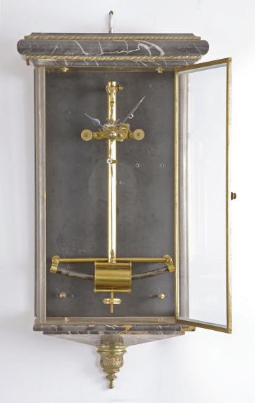 Parts Clocks- 2 (Two), Bulle Clock Co., France, a hanging electromagnetic wall clock with glazed front and sides, molded marble top and bottom, and small brass movement with two wheel train impulsed by an electromagnetic pendulum, together with a Self Winding Clock Co. striking rotary motor movement