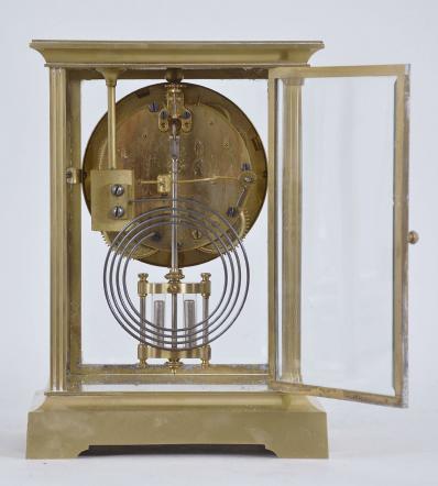 Seth Thomas Clock Co., Thomaston, Conn., "Empire No. 201" crystal regulator, 8 day, time and strike, spring driven movement in a glass and polished brass case, 4 inch silvered dial with arabic numerals and blued steel hands.