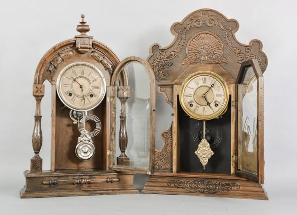 Clocks- 2 (Two): (1) Ansonia Clock Co., New York, unidentified shelf clock with a spring driven 8 day time and half hour strike movement in a walnut case. c.1890. (2) E.N. Welch Mfg. Co., Forestville, Conn., "Assortment F- No.32" shelf clock with a spring driven 8 day time and strike movement in a walnut case, c1901.