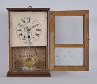 S. B. Terry. Plymouth, Conn., 30 hour, spring driven brass movement cottage or cigar box shelf clock.