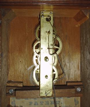 S. B. Terry. Plymouth, Conn., 30 hour, spring driven brass movement cottage or cigar box shelf clock.