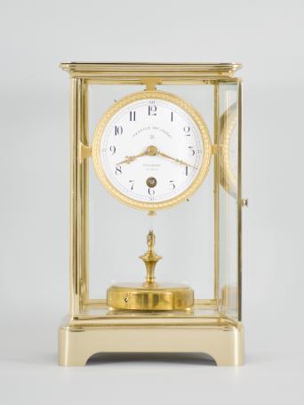 C. Grivolas and Cie, Paris, France, "Pendule 400 Jours" 400-day clock, year running, time only, spring driven movement with torsion pendulum in brass and glass crystal regulator case, arabic numeral white enamel dial, gilt hands.