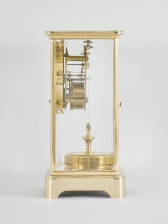 C. Grivolas and Cie, Paris, France, "Pendule 400 Jours" 400-day clock, year running, time only, spring driven movement with torsion pendulum in brass and glass crystal regulator case, arabic numeral white enamel dial, gilt hands.