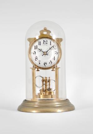 Attributed to Andreas Huber, Munich, Germany, "Yearlong" 400-day or anniversary clock, year running, time only, spring driven brass movement with temperature compensating Huber twin-loop bimetallic torsion pendulum, silver colored dial with black arabic numerals, and black steel hands, all under a glass dome.